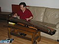 A Chinese harp player in hostel