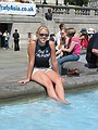 Michelle with her feet in fountain