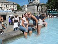 Katy and Michelle in a fountain on Trafalgar Square