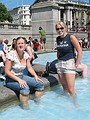 Katy and Michelle in a fountain on Trafalgar Square